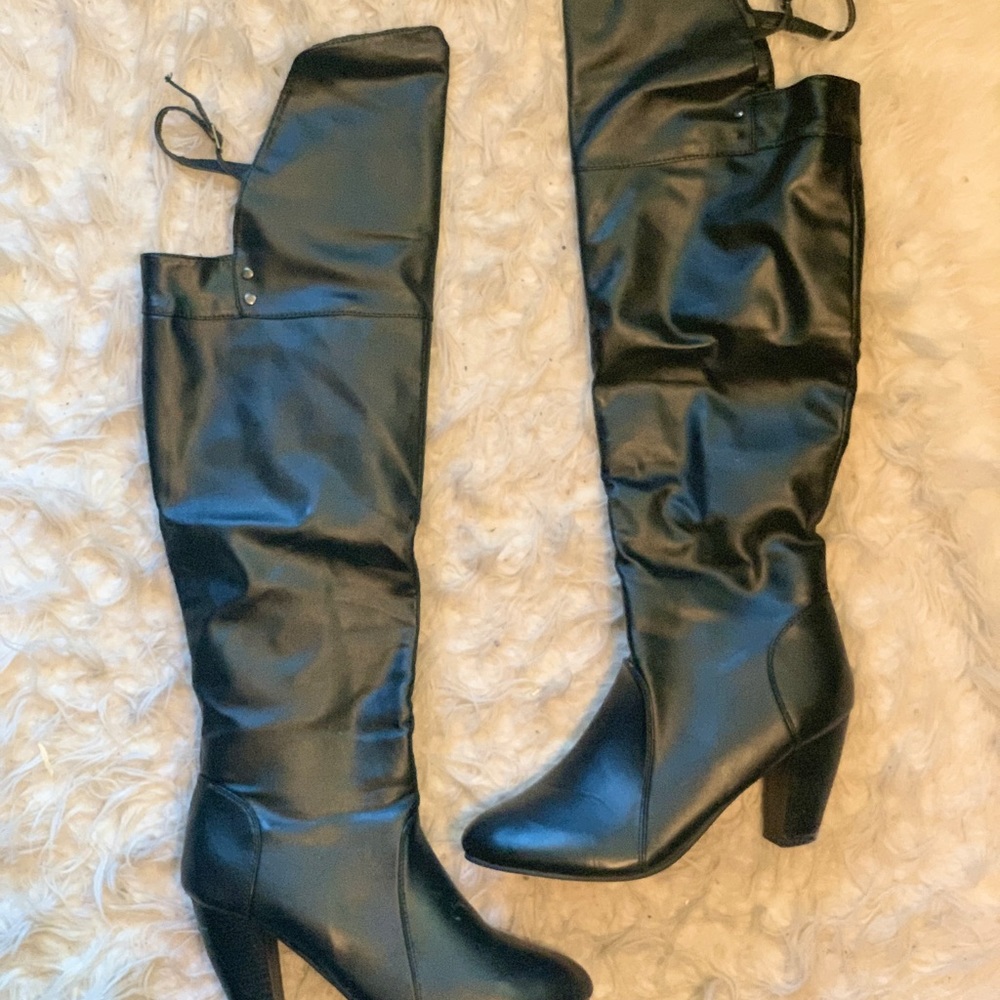 Thigh high black boots